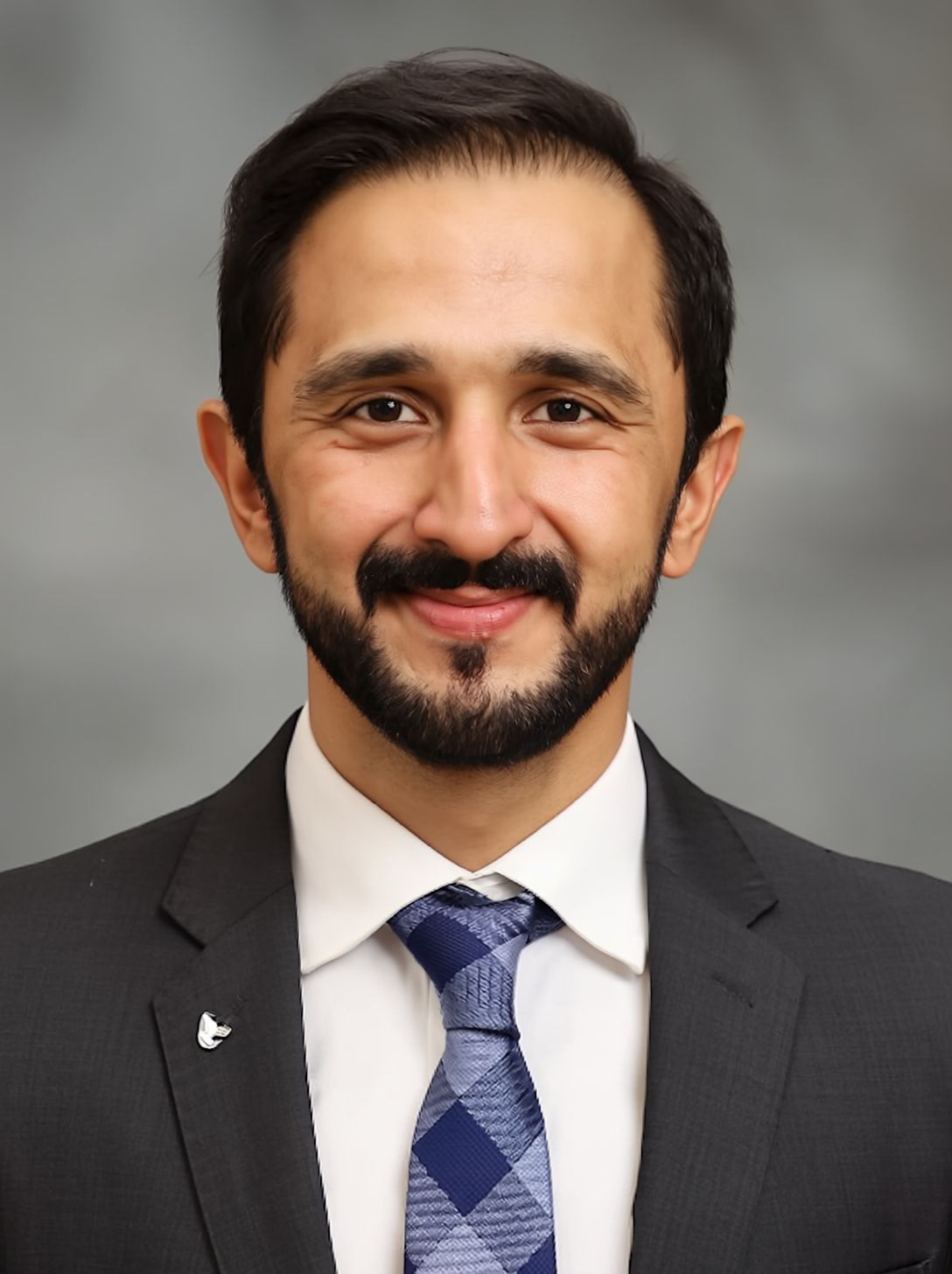 Headshot of Dr. Saad Usmani